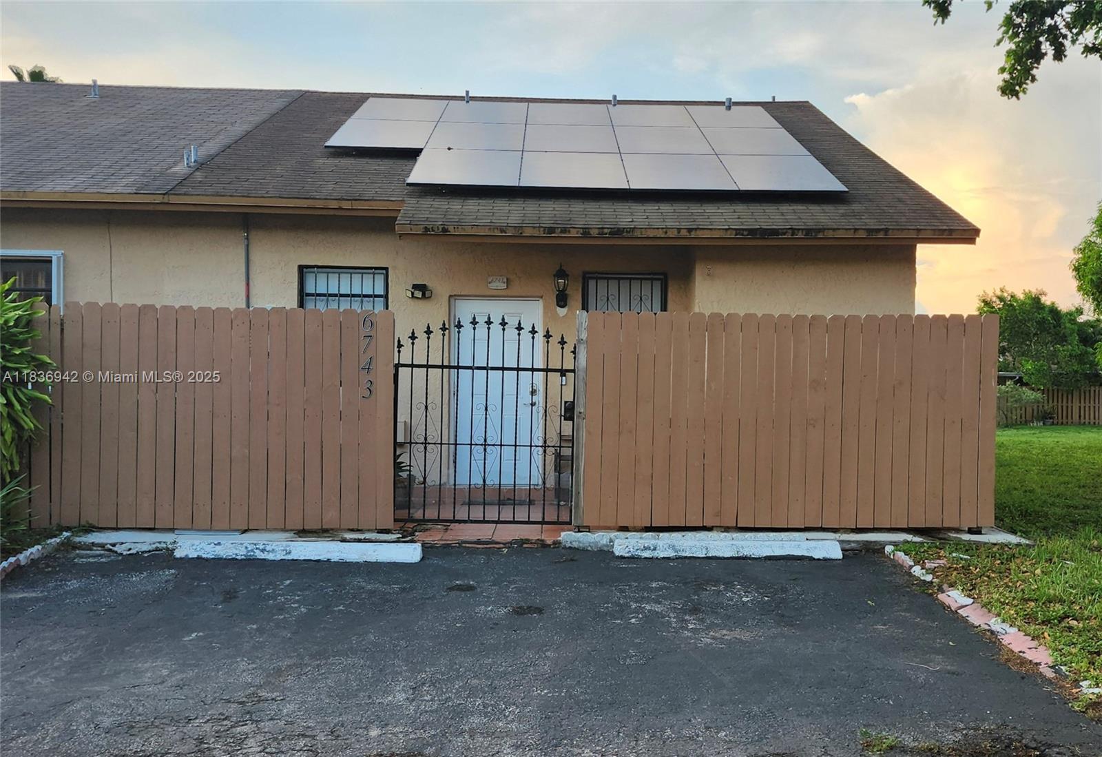 Welcome to this charming and spacious renovated corner townhouse featuring 2 bedrooms and 2 full bathrooms. The modern kitchen is equipped with SS appliances and granite countertops. This home offers ample closets space and energy-saving solar panels. Enjoy a fully paved, fenced and private patio, ideal for relaxing or entertaining, complete with storage shed and a mature mango tree. Located in a quiet, family-oriented neighborhood, just across the street from community amenities. Conveniently close to shopping centers, supermarkets, banks, restaurants, schools, and parks. This townhouse offers the perfect blend of comfort, convenience and community living. Small pet allowed (with restrictions) Easy to show. Please allow 24-hour notice for showings!