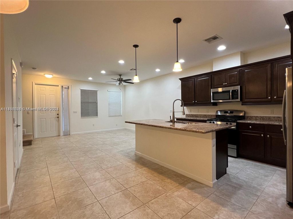 Photo of 12541 NW 32nd Mnr #12541, Sunrise, FL 33323 (MLS # A11498594)