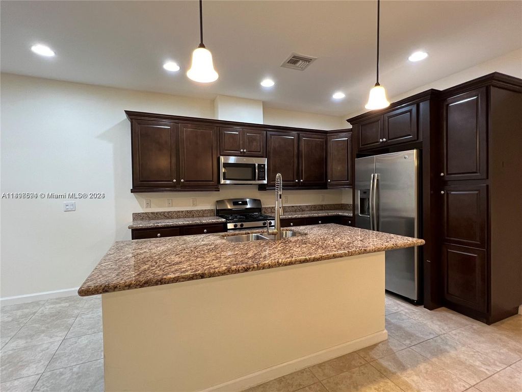 Photo of 12541 NW 32nd Mnr #12541, Sunrise, FL 33323 (MLS # A11498594)
