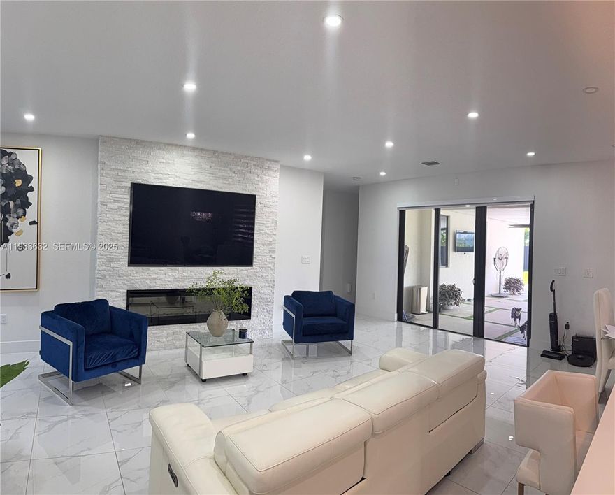 An exceptional 5-bedroom, 4-bath residence set on an expansive 0.35-acre lot with no HOA. Designed for refined living and effortless entertaining, this home features a private in-law quarters, a 2-car garage, and a resort-style outdoor kitchen with an expansive terrace ideal for hosting. Generous living spaces, seamless indoor-outdoor flow, and a functional layout offer both privacy and versatility for multi-generational living or executive retreats. A rare opportunity combining space, comfort, and freedom with no HOA restrictions.