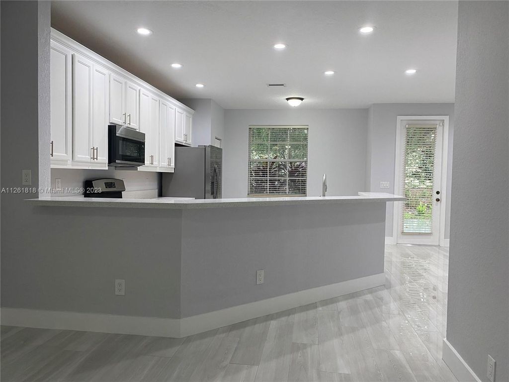 Photo of 619 Castle Dr, Palm Beach Gardens, FL 33410 (MLS # A11261818)