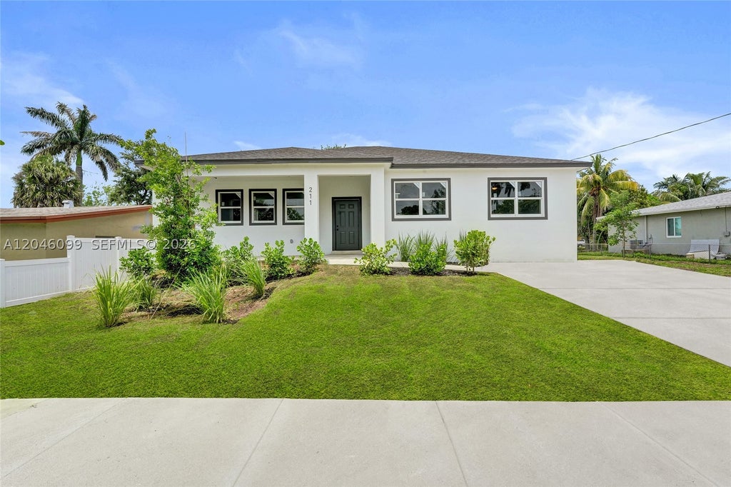 Photo of 211 NW 14th Ct, Dania Beach, FL 33004 (MLS # A12046099)