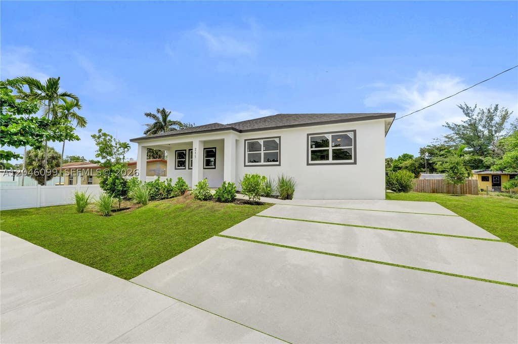Photo of 211 NW 14th Ct, Dania Beach, FL 33004 (MLS # A12046099)