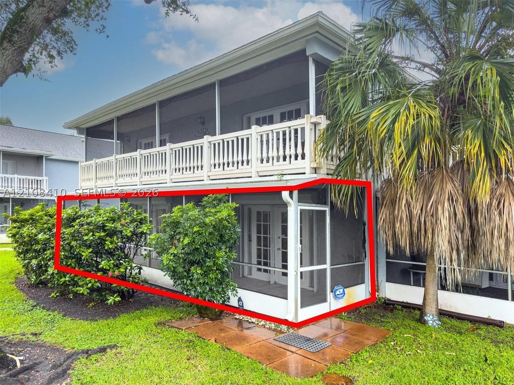 Photo of 7556 Stirling Rd #124, Davie, FL 33024 (MLS # A12108410)