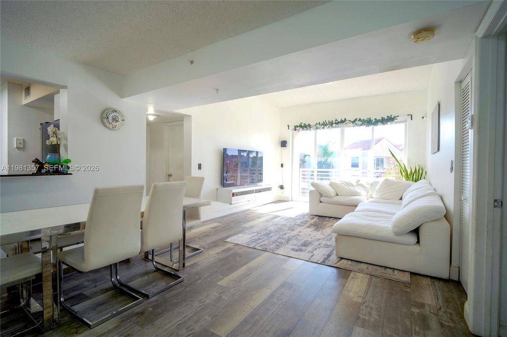 Photo of 2721 Ocean Club Blvd #303, Hollywood, FL 33019 (MLS # A11981357)