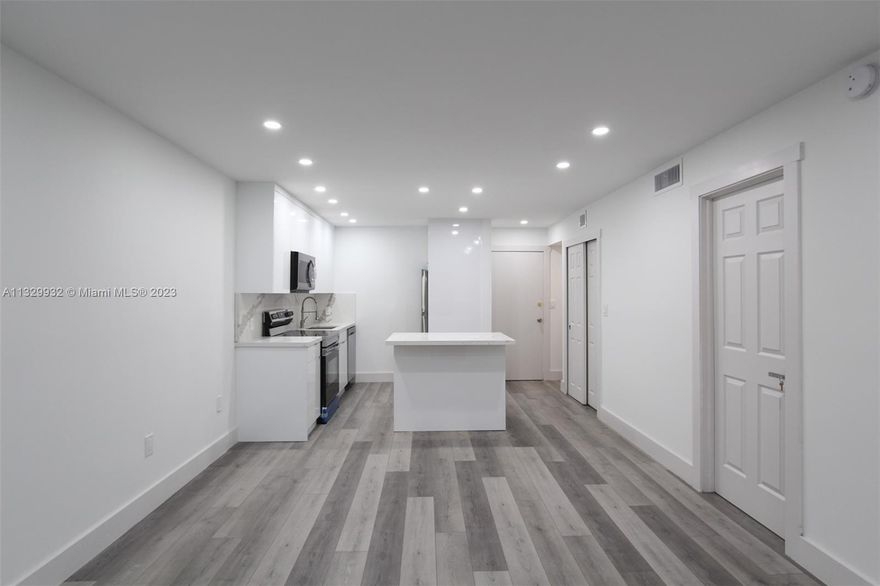 COMEPLETELY UPDATED MODERN LOOK UNIT! IMPACT WINDOWS AND SLIDING DOORS! 1 ASSIGNED PARKING SPACE. New River canal front building. Centrally located near restaurants and main highways. Unit features Open kitchen with granite counter tops and cooking island. Stainless steel appliances. Wood laminate flooring throughout. Master bedroom with walk-in closet and master bathroom en-suite with walk-in shower. Half bath. Community pool.