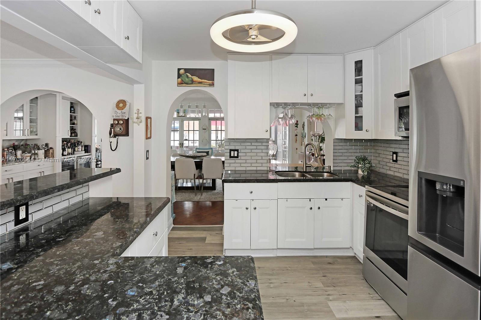 FABULOUS LOCATION! Just minutes from the Intracoastal and a serene state park with a convenient boat ramp, this home offers the perfect blend of charm and modern updates.
Step into a bright and welcoming space where an open kitchen with granite countertops, a sleek glass subway tile backsplash, and new appliances flows seamlessly into the living room. Solid wood floors and impact windows add timeless beauty and peace of mind throughout.
Perfect for entertaining or unwinding, the massive enclosed Florida Room, dedicated bar area, and outdoor Jacuzzi with a fully screened enclosure create a private oasis for any occasion.
Don’t miss this chance to make this charming home your own slice of paradise!