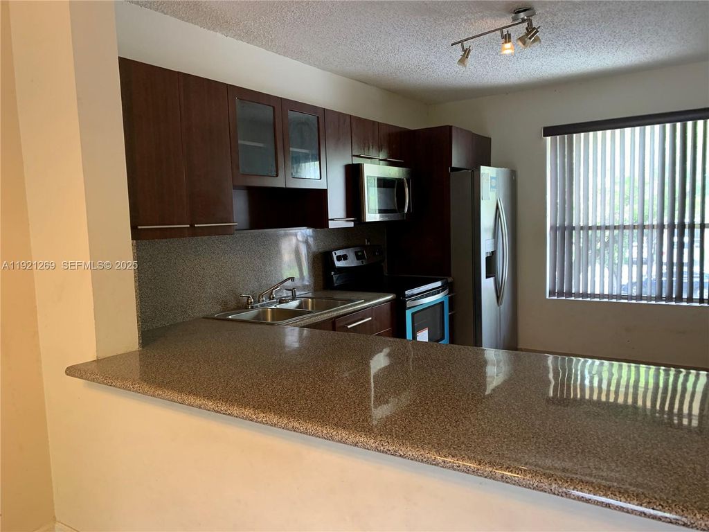 Photo of 2171 SW 80th Ter #2171, Miramar, FL 33025 (MLS # A11921269)