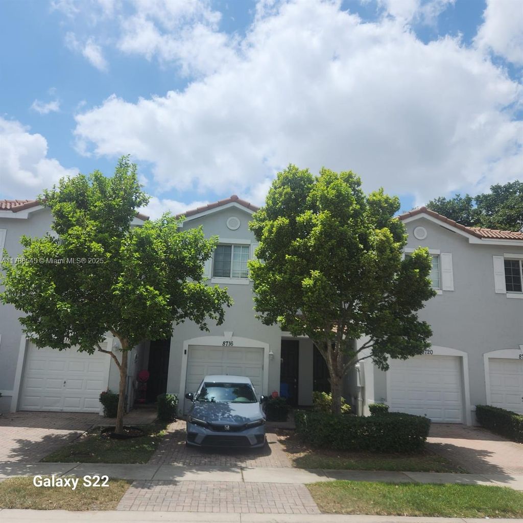 Photo of 8716 Cypress Walk Ct, Tamarac, FL 33321 (MLS # A11788545)