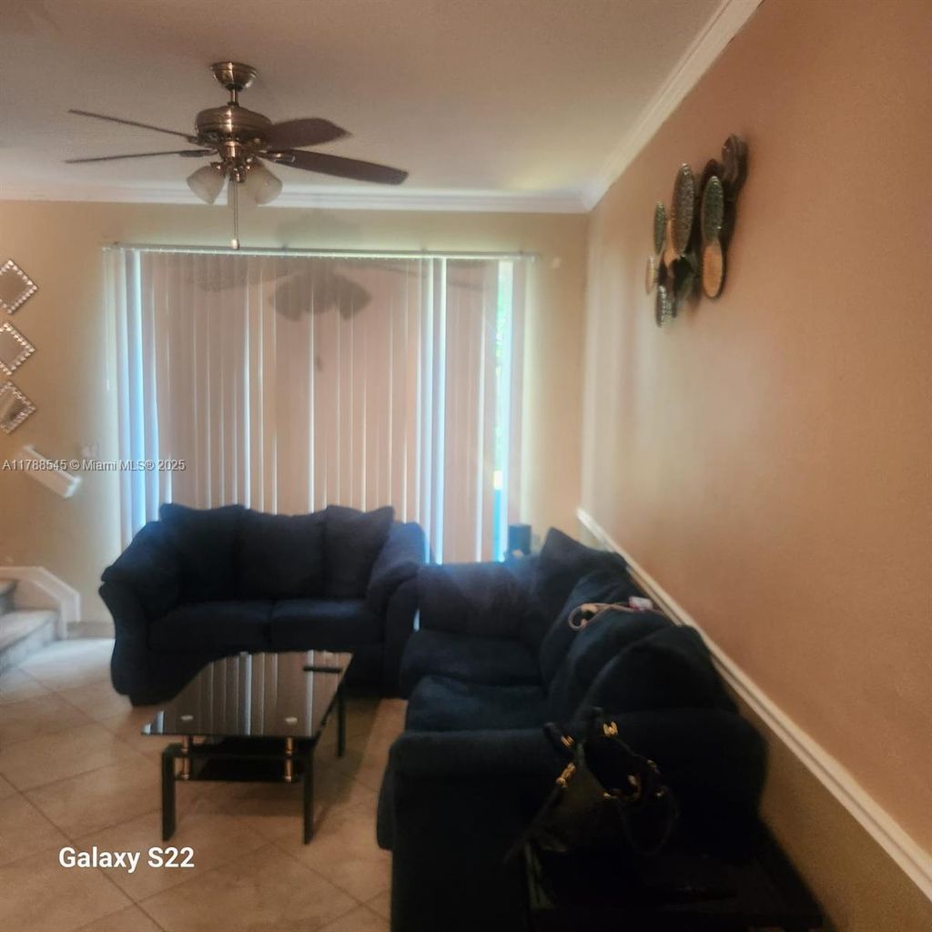 Photo of 8716 Cypress Walk Ct, Tamarac, FL 33321 (MLS # A11788545)