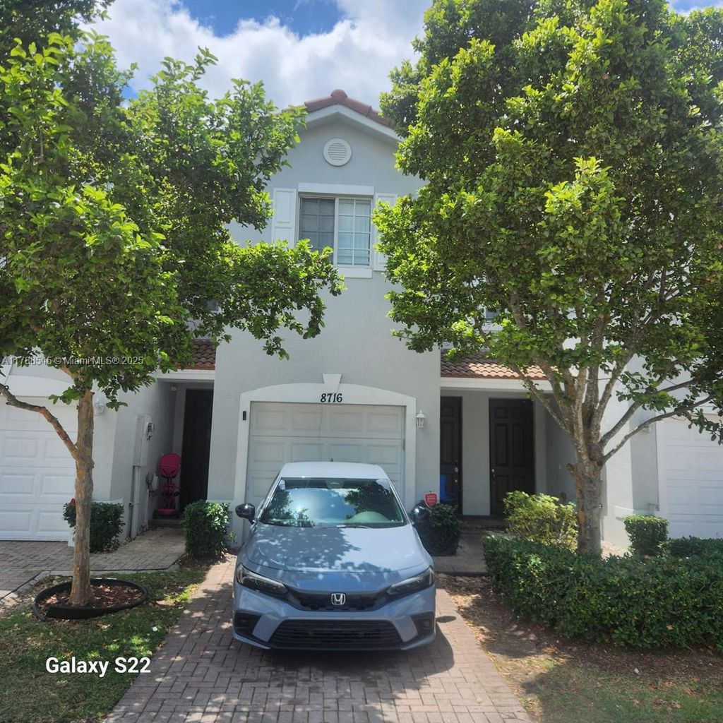 Photo of 8716 Cypress Walk Ct, Tamarac, FL 33321 (MLS # A11788545)