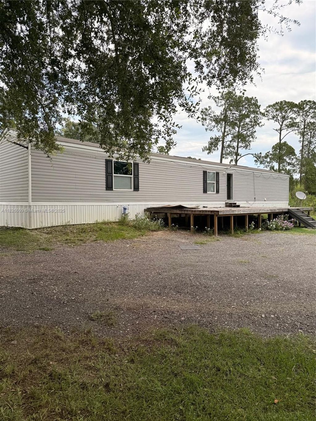 Photo of 751 appaloosa Ave, Clewiston, FL 33440 (MLS # A11826009)