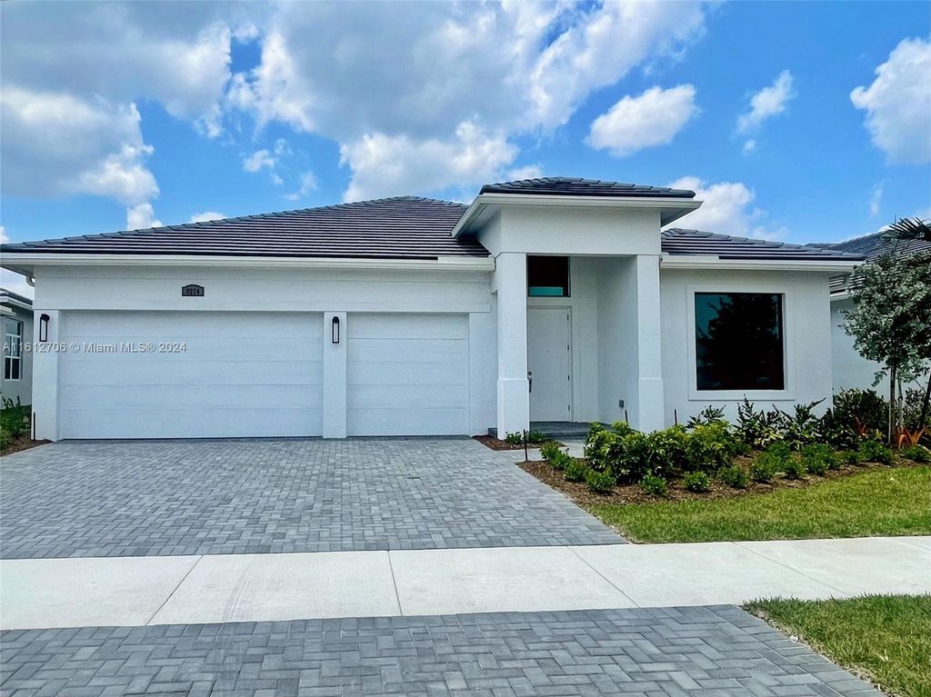 Photo of 9214 SW Esule Way, Port Saint Lucie, FL 34987 (MLS # A11612706)