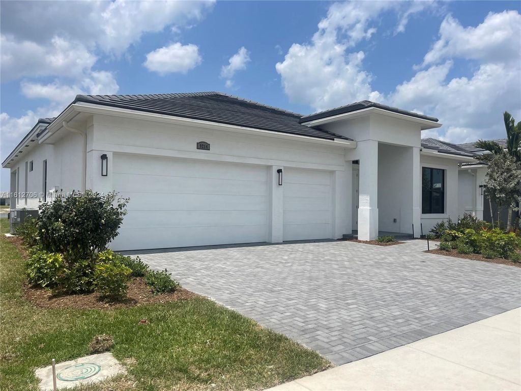 Photo of 9214 SW Esule Way, Port Saint Lucie, FL 34987 (MLS # A11612706)