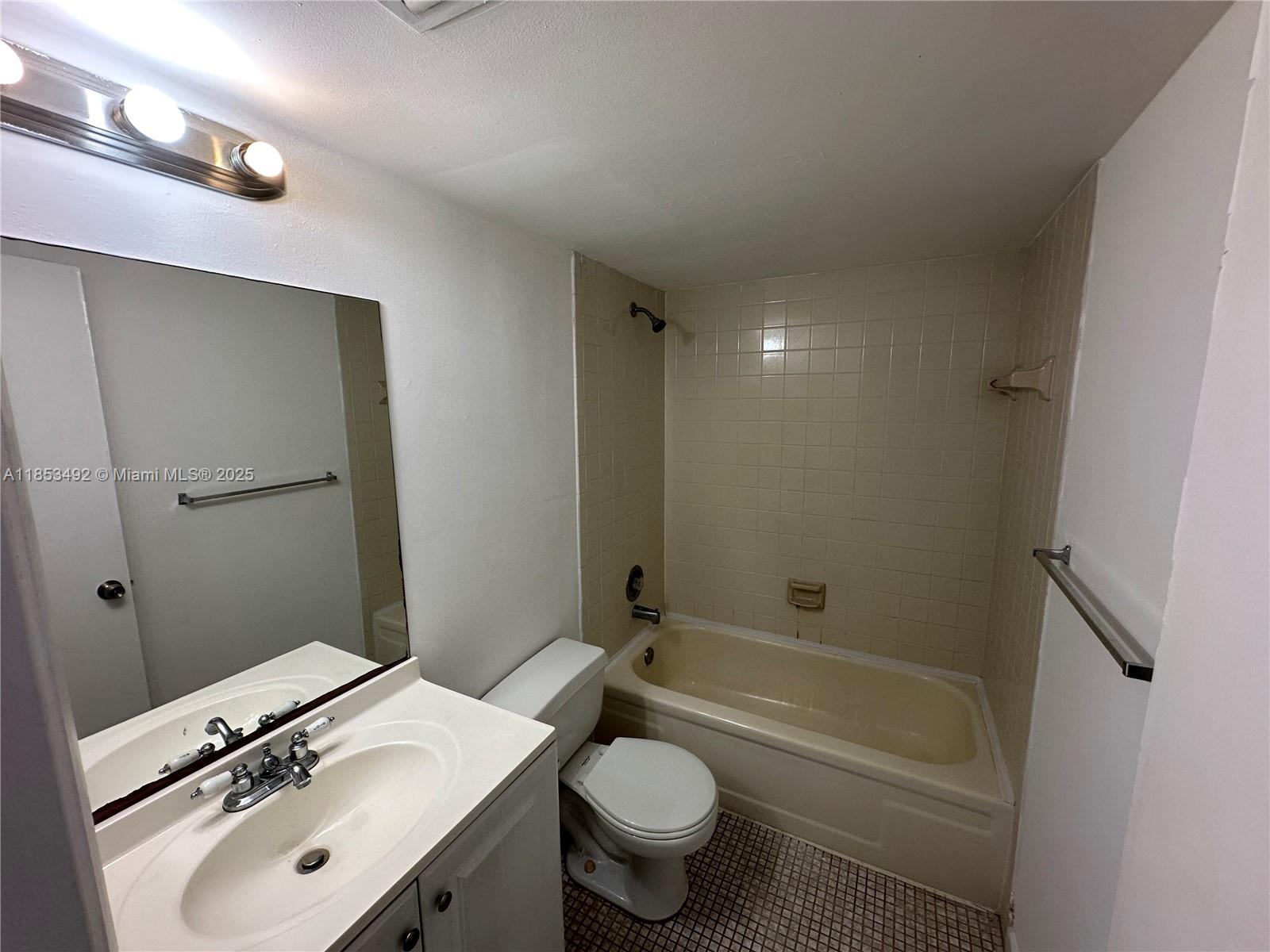 Ready to move in, remodeled kitchen with modern appliances. Washer and dryer inside the unit. All tile floors. Granite counters. Gated community, 24/7 security at gate. Community pool. In House management. Close to major avenues and Turnpike, shopping and schools. FAST APPORVAL (under 5 days)