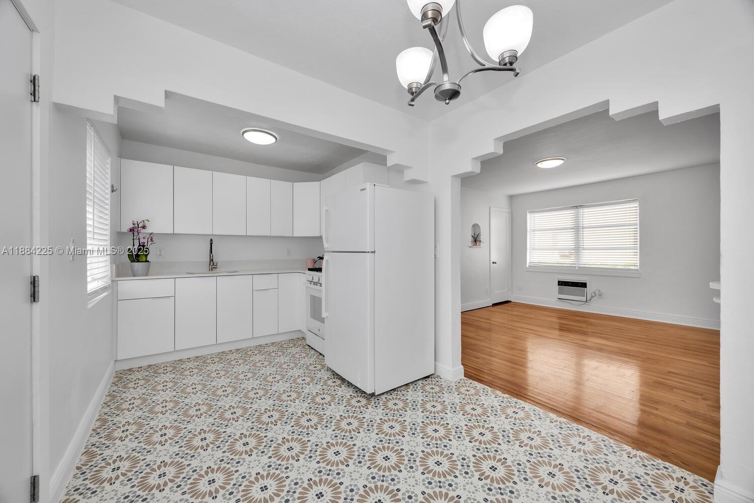 A wonderful and central Coral Gables location between Ponce de Leon and Douglas Road. This excellent area of Miami offers theaters, wonderful restaurants around Miracle Mile, gyms and parks. The apartment has beautiful wood floors throughout. Located on the first floor of a two story building. Wonderful new kitchen and a new bathroom with shower. Clean apartment in good condition. Plenty of natural light. A total of 4 units in the building. Washer/dryer is available for all units on the property to share. Located behind the building. One AC unit in each of the 3 rooms (2 bedrooms). A comfortable setting with grass and plenty of street parking. Happy to show. No pets. Advance notice needed to see inside.