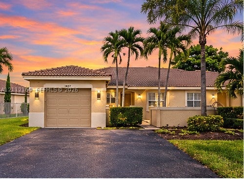 Photo of 1867 Andromeda Ln, Weston, FL 33327 (MLS # A12112160)