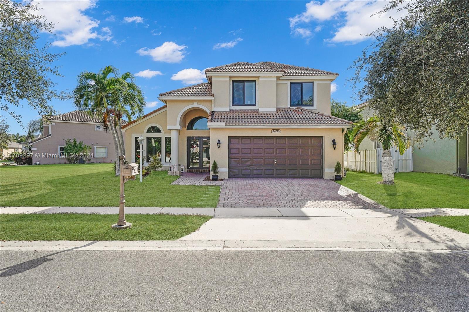 STUNNING LAKEFRONT MALIBU MODEL in desirable Pembroke Falls! This impeccably renovated 4-bedroom, 2.5-bathroom home is a true must-see! Located on Oversized Corner lot, it boasts luxurious finishes and modern design elements throughout. Features include high-impact windows and doors, beautiful new tile flooring in first floor, wood in the second floor. Modern gourmet kitchen with quartz countertops, stainless steel appliances, and a spacious central island. The open-concept floor plan is perfect for entertaining, with a spacious 1st-floor master suite featuring a large walk-in closet. The resort-style Pembroke Falls clubhouse, including a heated pool, spa, fitness center, tennis/pickleball courts, basketball court, and a grand ballroom.