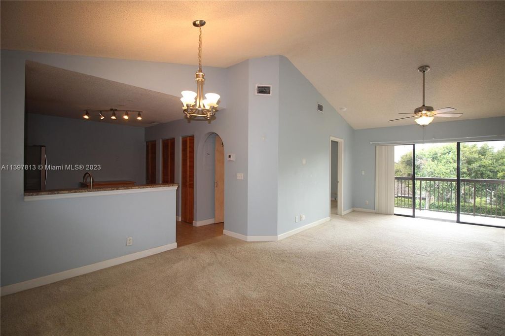 Photo of 5641 Riverside Dr #303B1, Coral Springs, FL 33067 (MLS # A11397813)