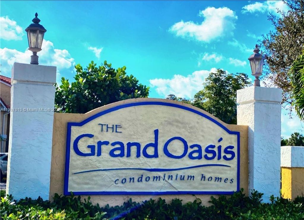 Photo of 5641 Riverside Dr #303B1, Coral Springs, FL 33067 (MLS # A11397813)