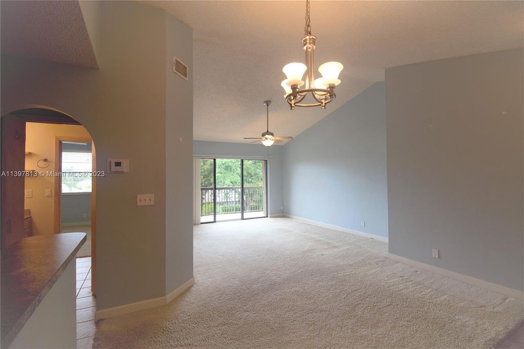 Photo of 5641 Riverside Dr #303B1, Coral Springs, FL 33067 (MLS # A11397813)