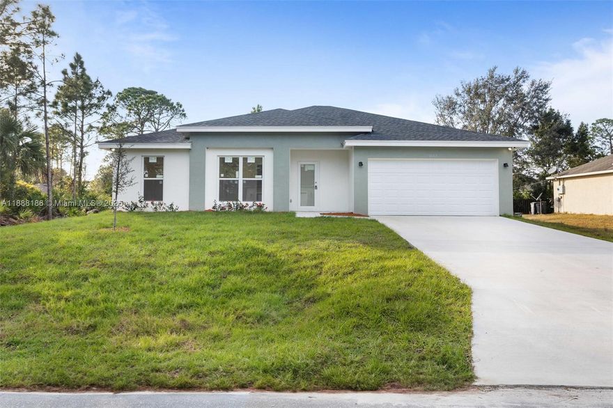 This beautiful house has a modern design with 4 bedrooms and 2.5 bathrooms, including a convenient half bathroom for guests. High ceilings and an open floor plan connect living areas, it has a large kitchen with stainless steel appliances, island and breakfast counter.  The property has a large lot, with space to install a pool.  With impact windows, inside laundry and a two-car garage,   this home is truly designed for comfortable, contemporary living. Elementary School: Columbia. Middle School: Viera. High School: Bayside.