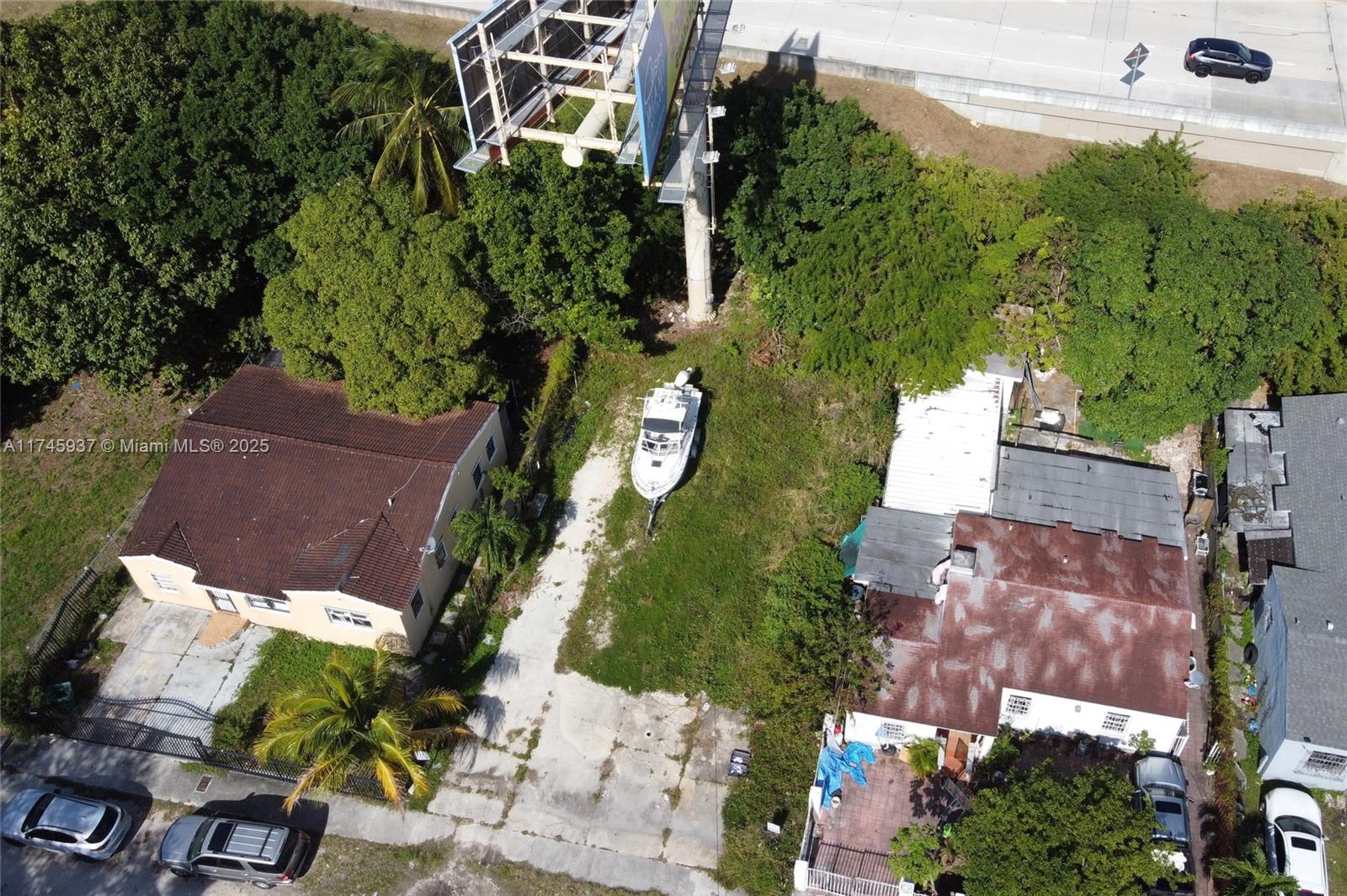 The property may go to auction soon. If you're interested, act now before multi-bidding. $700K FIRM Nr Design District, Midtown, Civic Ctr & Downtown. Attn Developers, Archs, Bldrs. Investors. Develop 5750 SF lot in Wynwood Norte RDD2 1 blk N of NW 36 St off NW 3rd Ave. Build up to 6 story Mixed Use Comm/Resi maybe more w/entitlements. Density 150 units/ac. Lot coverage footprint approx. 4,600 SF. There is ingress & egress for the BB Co to operate their billboard. Long-term ground lease, 89 yrs approx. remaining. Lessee pays ST, utils, $2M prop & liab policy, Lessor is co-insured. Lessor pays RE Tax. Value is the Buildable Lot; the BB revenue is ongoing while developing, and through lease end approx 09-30-2114. SOLD “AS-IS” cash to Seller, buyer(s) do own due diligence.