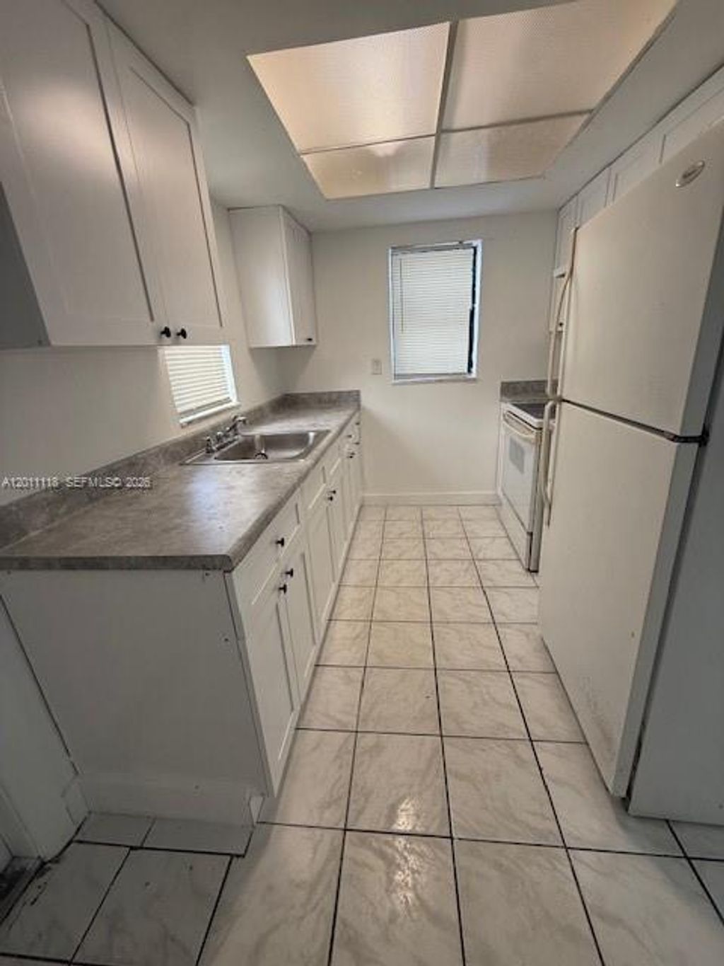 Photo of 2131 NW 26th Ave, Fort Lauderdale, FL 33172 (MLS # A12011118)