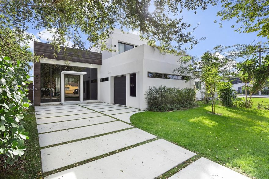 Located just a few blocks from the Miami Design District, these homes spans 3,642 Total SQ/FT, featuring a sleek black kitchen with state-of-the-art appliances, 13' ceilings, and spacious living areas. The outdoor space is perfect for entertaining, with a pool, patio, and BBQ area. All within a prime location few blocks from the Design District mall, 2 miles from Wynwood, and 10 minutes from Miami Beach—this home exemplifies the quality and lifestyle of the new developments nearby. Reach out to schedule a viewing today!