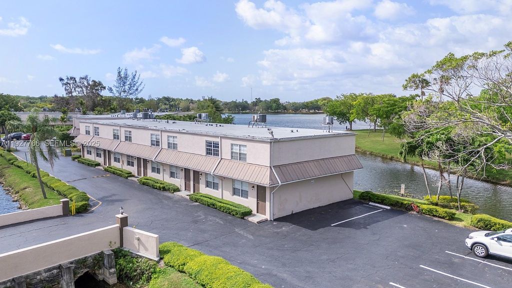 Photo of 4100 NW 16th Ave #25, Oakland Park, FL 33309 (MLS # A11927766)