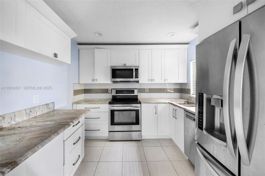 Move right into this charming 2-bedroom, 2-bath condo in Applewood Village II at The Township! Enjoy a bright, open layout, spacious living areas, and a screened balcony with peaceful lake views. Community perks include pools, clubhouse, fitness center, tennis courts, and walking trails. HOA covers cable, water, and exterior maintenance. Perfectly located near shopping, dining, and highways, this well-maintained Coconut Creek home offers comfort, convenience, and a lifestyle you’ll love!