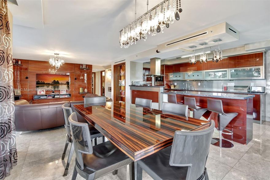 Enter and be wowed by this completely renovated corner unit with huge  wrap around balcony and breathtaking views! No Expenses Spared! Finest finishes include: Open kitchen with Miele and Subzero appliances, All redone bathrooms, Impact Windows, Marble and Hardwood Floors, etc. Watch the boats go by and make it your dream home! Highly renowned Turnberry Tower with newly renovated lobby. Amenities include 24 hour security, heated pool, fitness center, sauna & spa. A must see! Seller Paid Special Assessment in Full!