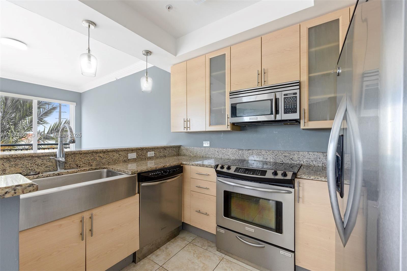 Beautiful Corner 1BR/1.5BA Condo in Desirable Wilton Station. Bright and spacious south-facing unit featuring 3 impact sliding doors and 2 private balconies. Tile floors and crown molding throughout. The kitchen boasts stainless steel appliances, 42" cabinets, and an in-unit washer/dryer. Located in Wilton Station, a gated 10-acre, pet-friendly community (up to 75 lbs, non-aggressive breeds). Enjoy resort-style amenities including a lagoon-style pool with waterfalls, a clubhouse with fitness center, party room, library, conference room, and catering kitchen. Additional storage available for kayaks, canoes, and bicycles. HOA fees cover cable, internet, water, sewer, trash, insurance, fully funded reserves, gatehouse security, pool, and landscaping.