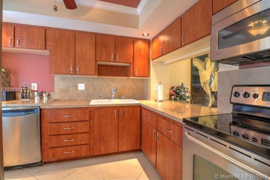 Great opportunity to own this immaculate 2 bed 2 bath condo in a fabulous 55+ community in BOCA RATON. Seller motivated! Top Floor with LAGOON & CANAL view from screened Balcony, for Relaxing & Enjoying the Evening Breezes or a Great Morning Coffee. Conveniently located just 15 minutes away to the beach, close to parks, malls, Mizner Park, Golf courses and the Boca Resort. Move right into this recently remodeled unit, WITH updated bathrooms and kitchen, including new stainless steel appliances and granite counter tops. Tile floors throughout. Newer pool for your enjoyment