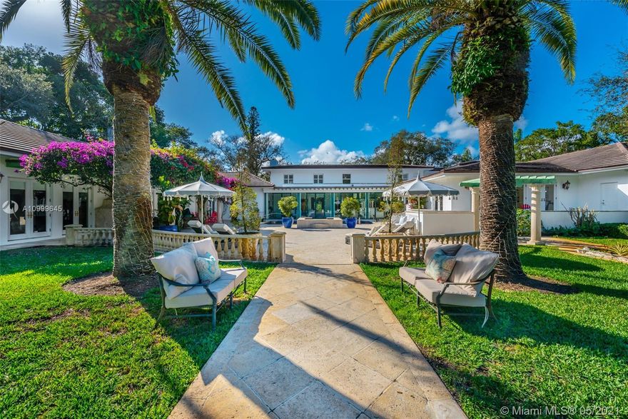 Best Value in Snapper Creek Lakes. PRICE IS FIRM. Sprawling acreage, 24/7 manned guard gate, full service private marina w/gas dock-this is the place for your forever home! On a lush oversized lot sits a gem! French facade w/ Old Florida accents, staggered additions/updates make this house an individual. Personality exudes! Natural light+breathtaking views are this home’s signature. Huge basement wine cellar w/tasting + media rooms, large eat-in chef’s kitchen, 1st floor expansive master suite, private guest suite, staff quarters, 3-car garage, coral rock fireplace, sport court, inviting pool/dramatic grounds. Add your touch to make this your dream home in your dream neighborhood! Per appraiser: 7743 Liv Area+744 of Bonus AC Basement = 8,487 Tot Under Air on huge 56,192 sqft lot.