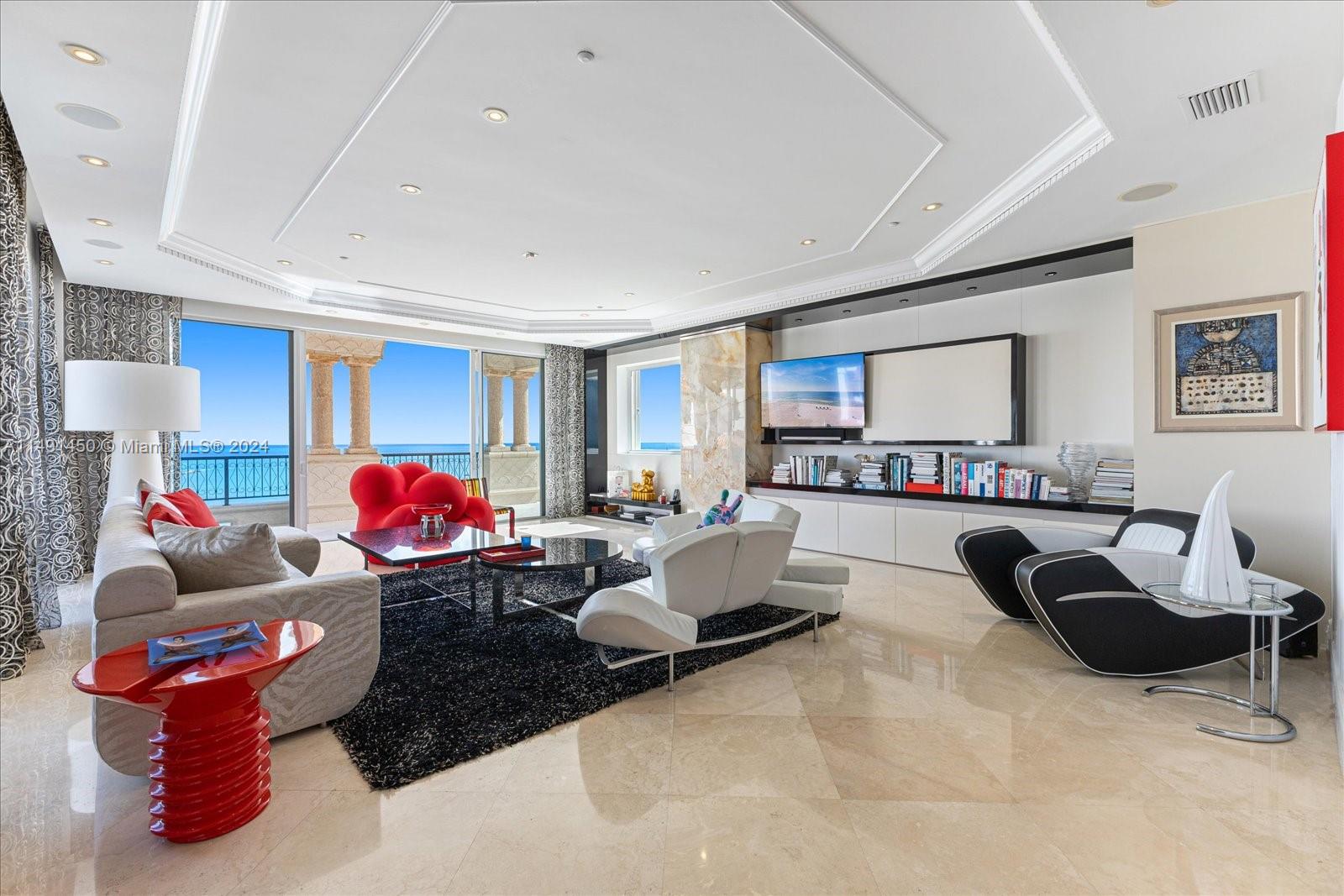 Explore this unparalleled Oceanside Tower Suite on Fisher Island offering 5 bedrooms, 6.5 baths and 4,932 sq. ft interior with raised ceilings up to 13 ft and 360-degree panoramic views of the Ocean, Government Cut, Miami Beach and Miami skyline. Marble floors grace the entirety of this residence. The private entryway leads to an open floor plan and spacious dining room with floor-to-ceiling impact glass doors throughout. Each bedroom features ensuite baths & closets, the principal bedroom has a his and hers bathroom. The expansive terraces are perfect for entertaining. This Fisher Island gem is located in one of the most desired Oceanside buildings. Pepe Calderin, the renowned interior designer who created this unique apt described it as "Eye Candy" in terms of both interior & exterior.