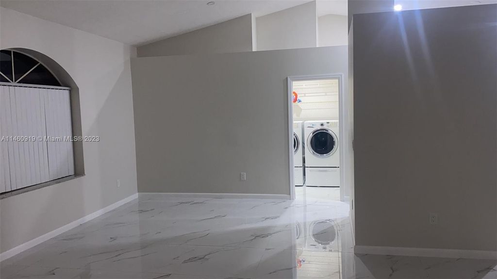 Photo of 1198 SW Ingrassina Ave, Port Saint Lucie, FL 34953 (MLS # A11460919)