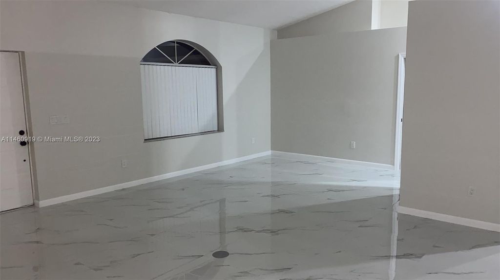 Photo of 1198 SW Ingrassina Ave, Port Saint Lucie, FL 34953 (MLS # A11460919)