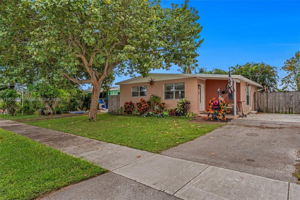 Photo of 1200 NW 41st St, Oakland Park, FL 33309 (MLS # A11900198)