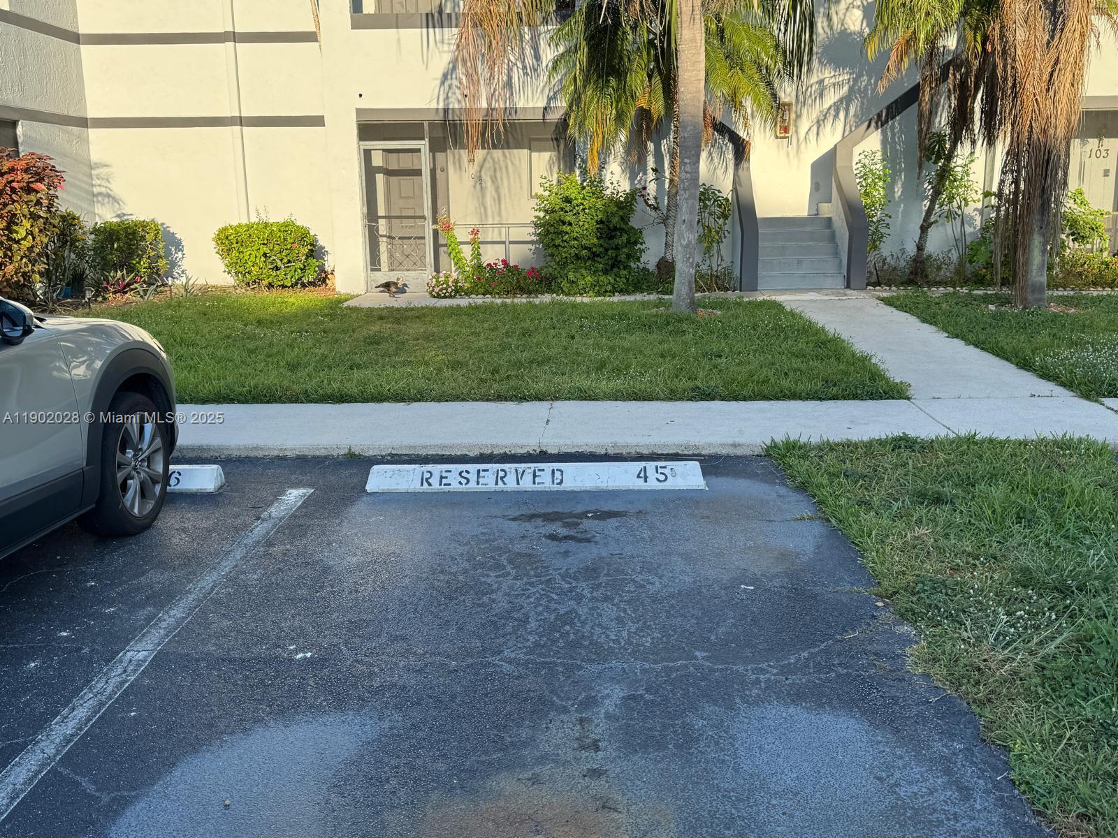 Spacious and bright first-floor condo ("Townhouse") in the heart of Weston! This 2-bedroom, 2-bath (Both completely renovated) unit features a functional layout with large living and dining areas, tile flooring throughout, and a screened-in patio with peaceful garden views. The kitchen includes plenty of cabinet space and stainless-steel appliances. The primary bedroom offers generous closet space and a private bathroom. Washer and dryer inside the unit. Assigned parking space right in front (#45) plus guest parking available. Enjoy a quiet community surrounded by lush landscaping, close to Weston Town Center, top-rated schools, major highways, and parks. Ready to move in!