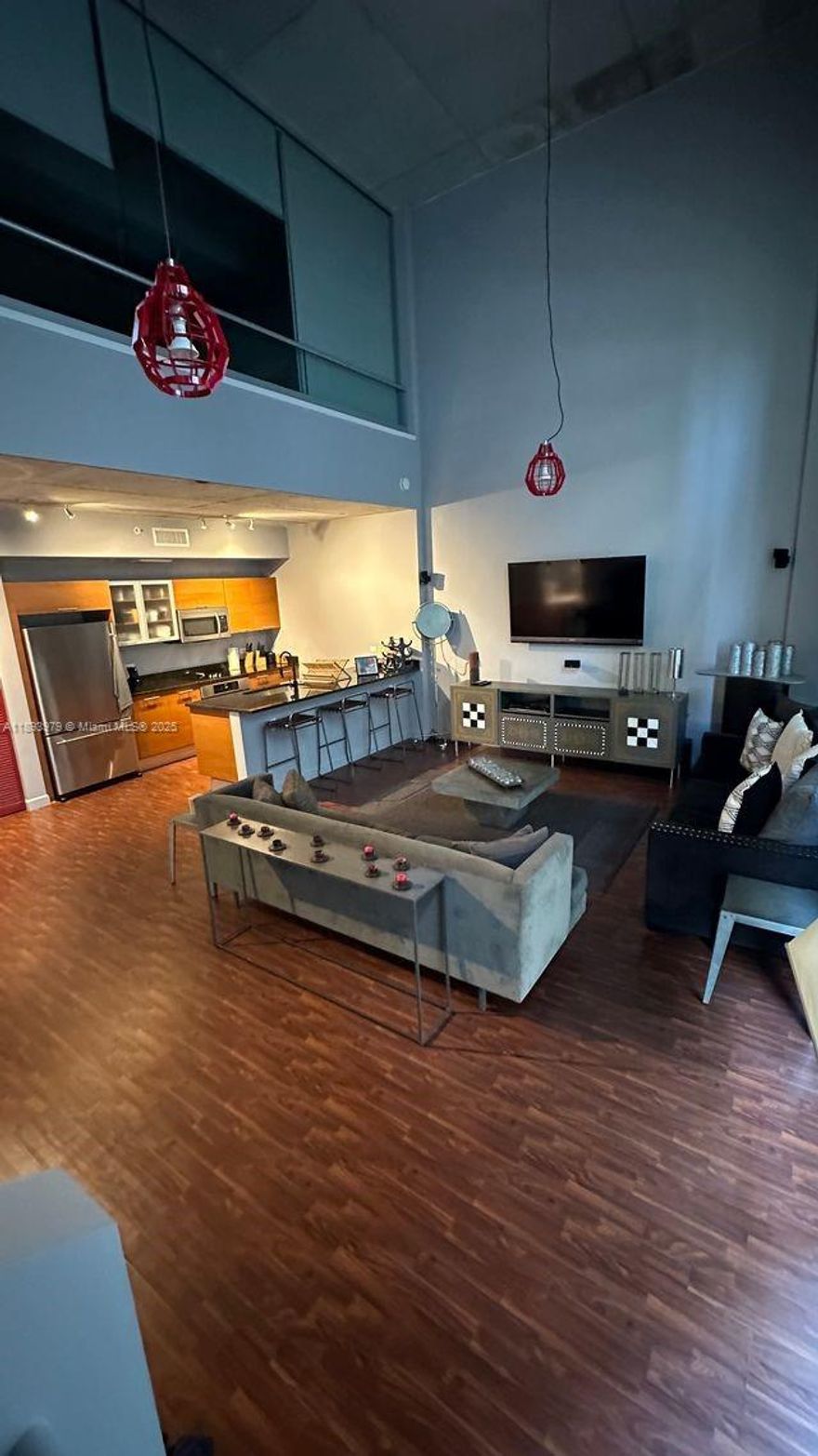 Beautiful 1-bed 1.5-bath completely furnished townhouse-style apartment in a residential building located in 2 Midtown, over 1400 SqF, with 1 parking spot.
