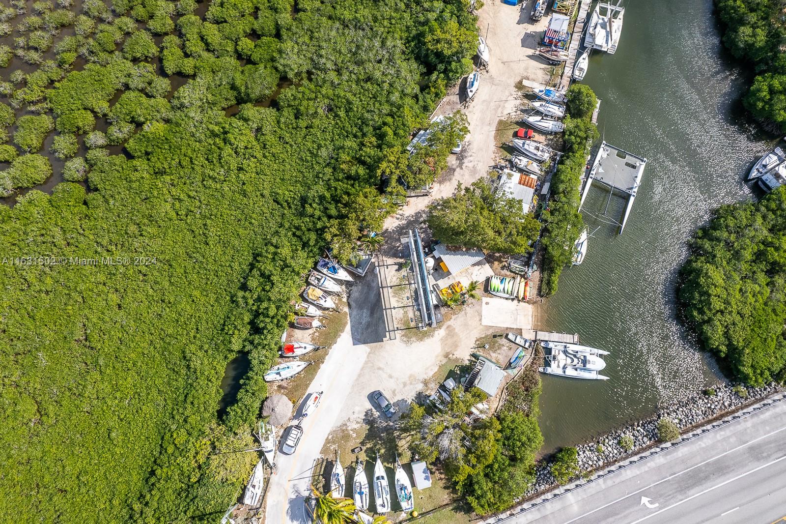 Great opportunity to own a working sailboat marina in the Entrance of the Florida Keys. Easy to manage and full. Great business 2-3 zoning, on a shoestring budget.
Zoned B3, liberal commercial in Miami Dade County. Has 27 boat slips in the water plus 25 boat positions on land. The property is a grand father fish camp that allows for cabins and short term rental, but the actual zoning is superior.
Hard formal left turn lane on US 1 for the property, and has a large road sign on the property with additional $8000 per month of income(control)reverting back to the property in 2 years
Short term seller financing is available.