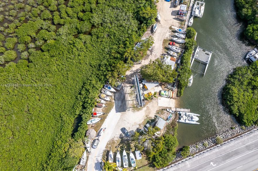 Great opportunity to own a working sailboat marina in the Entrance of the Florida Keys. Easy to manage and full. Great business 2-3 zoning, on a shoestring budget. 

Zoned B3, liberal commercial in Miami Dade County. Has 27 boat slips in the water plus 25 boat positions on land. The property is a grand father fish camp that allows for cabins and short term rental, but the actual zoning is superior.

Hard formal left turn lane on US 1 for the property, and has a large road sign on the property with additional $8000 per month of income(control)reverting back to the property in 2 years

Short term seller financing is available.