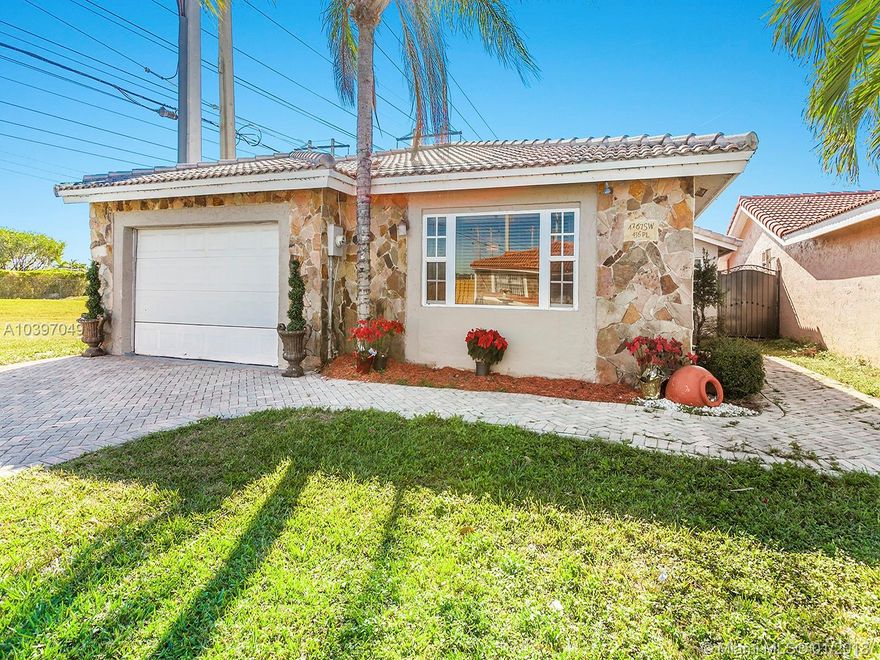 Completely updated 4/2 home ready for immediate occupancy. This property features all the high end finishes any buyer desires. Porcelain tile floors throughout, updated open kitchen with granite counter tops and stainless steel appliances, impact windows, updated master bathroom with honey onyx finishing and rain shower head, tank-less water heater and tons of storage space. Covered patio in the backyard is perfect for entertaining.