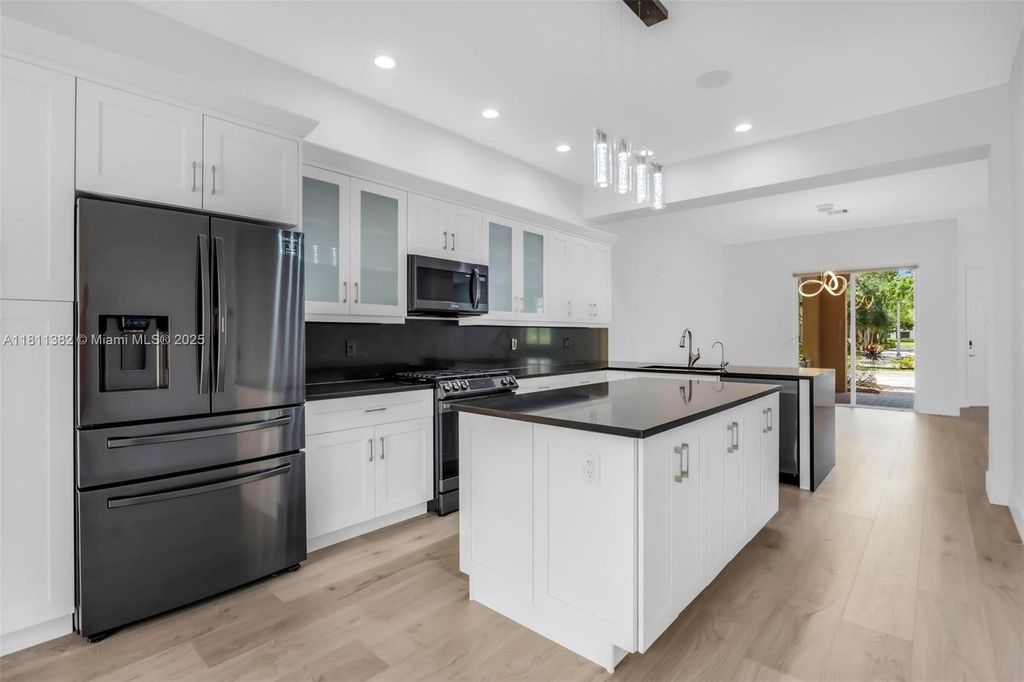 Photo of 3040 NW 126 Ave, Sunrise, FL 33323 (MLS # A11811382)