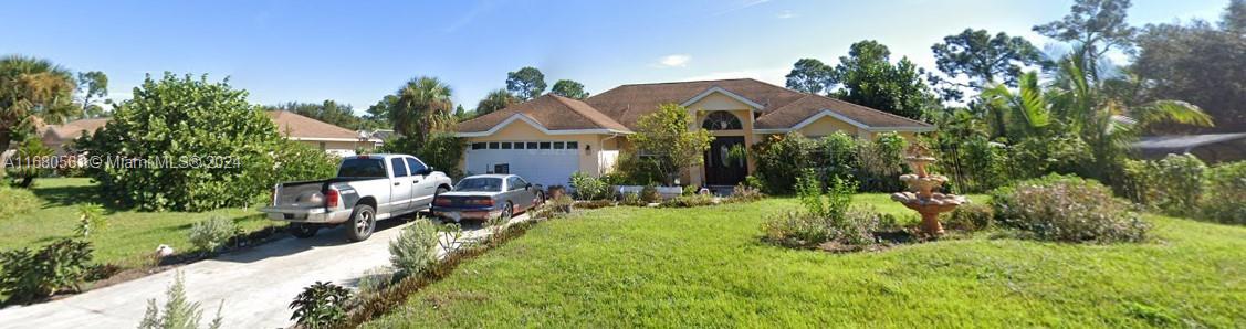 Welcome to your dream home in Lehigh Acres! This stunning single-family home boasts 3 bedrooms, 2 bathrooms, and a 2-car garage, providing ample space for you and your family. The in-ground pool is perfect for relaxing on hot summer days, while the office offers a quiet space to work from home. The kitchen features beautiful Corian counters and stainless steel appliances, making meal prep a breeze. The tile flooring throughout the home adds a touch of elegance and is easy to maintain. Situated on a half-acre lot, there is plenty of room for outdoor activities and entertaining. Whether you're looking to host family gatherings or simply enjoy a peaceful evening by the pool. Don't miss out on the opportunity to make this your forever home in Lehigh Acres. Schedule a showing today.