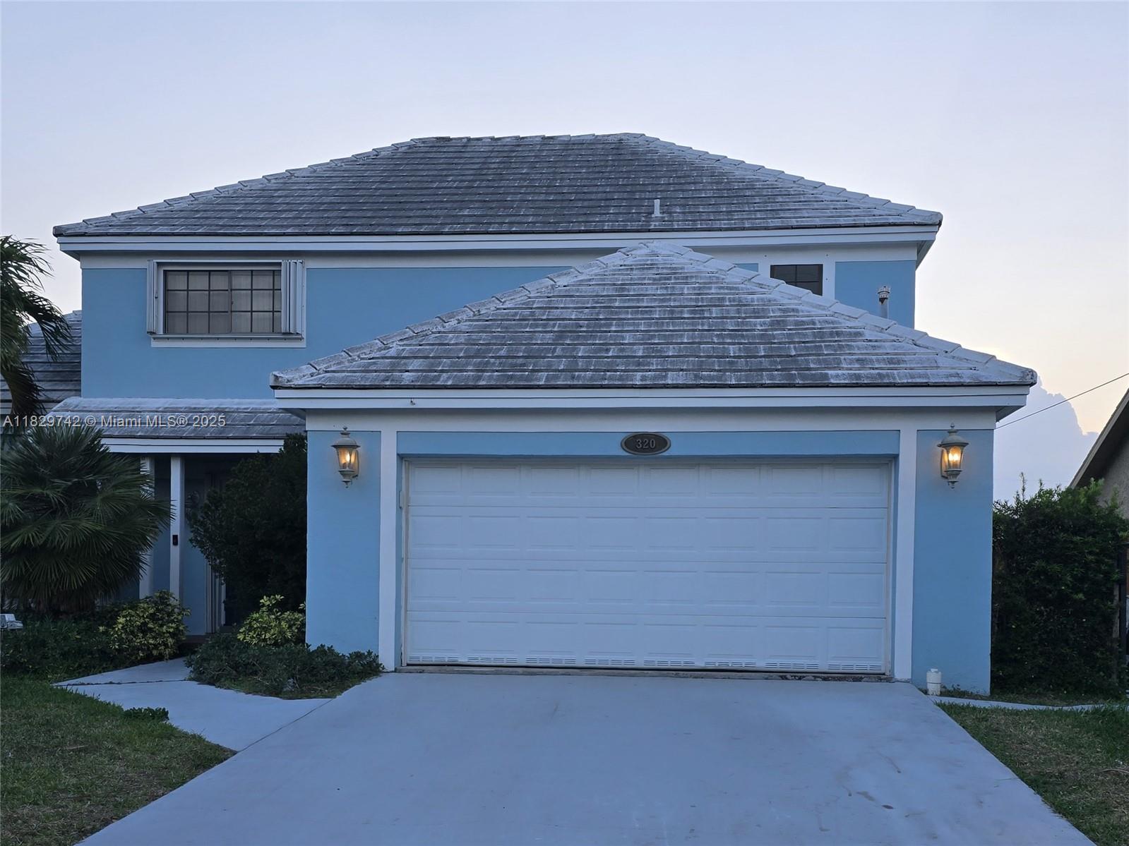 Beautiful waterfront house, one fixed bridge, heated salt water pool. Seasonal.