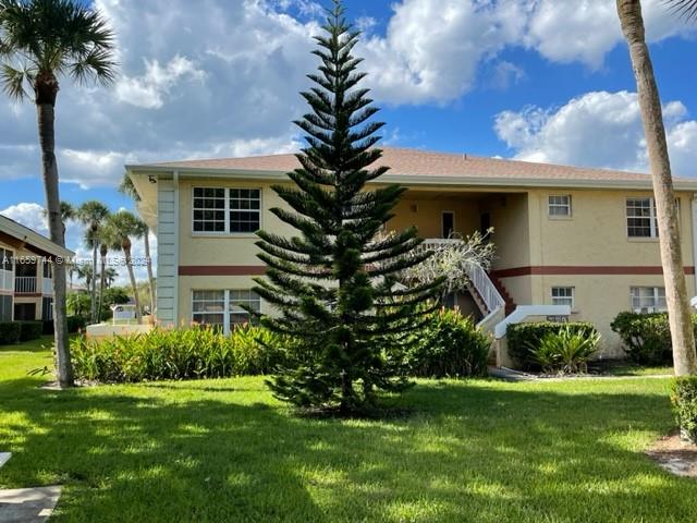 Photo of 1556 SE Royal Green Cir #203, Port Saint Lucie, FL 34952 (MLS # A11659744)