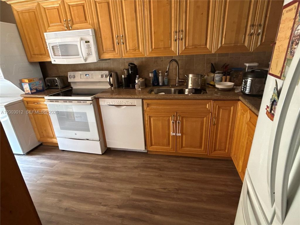 Photo of 9955 NW 10th St #24, Pembroke Pines, FL 33024 (MLS # A12003012)
