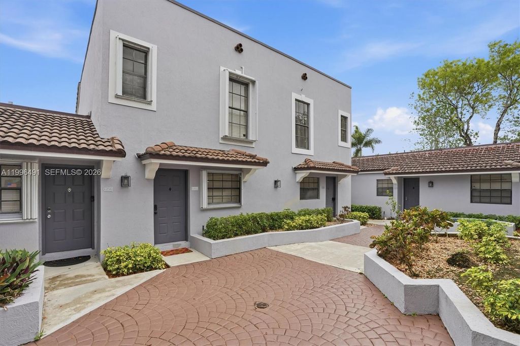 Photo of 11719 NW 11th St, Pembroke Pines, FL 33026 (MLS # A11996491)